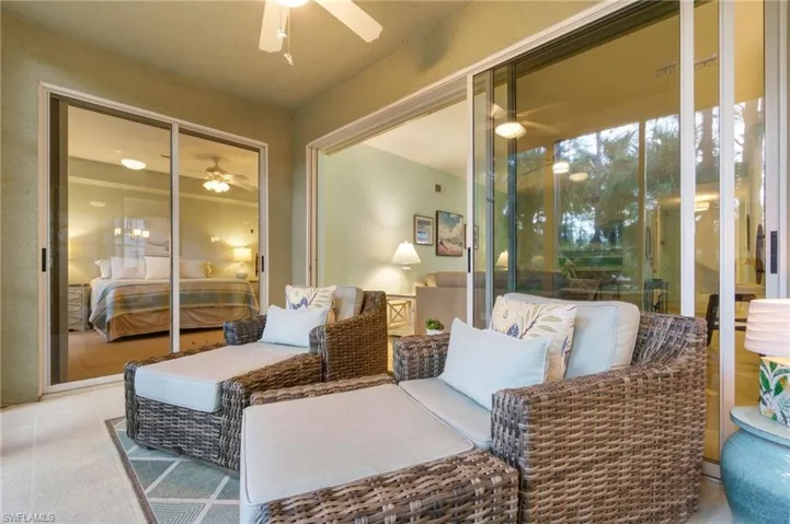 Sunroom / solarium featuring ceiling fan