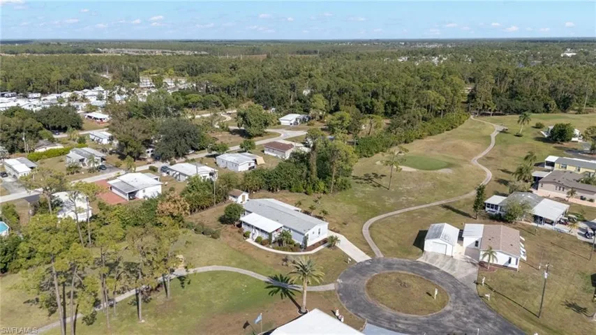 View of property location with nearby suburban area and a golf course