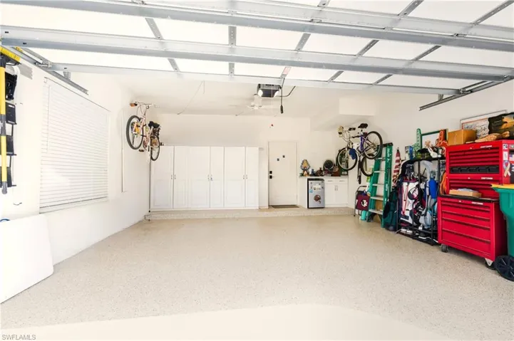 2 car garage with epoxy floor & storage