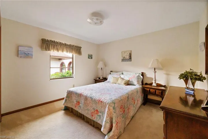 Bedroom with carpet