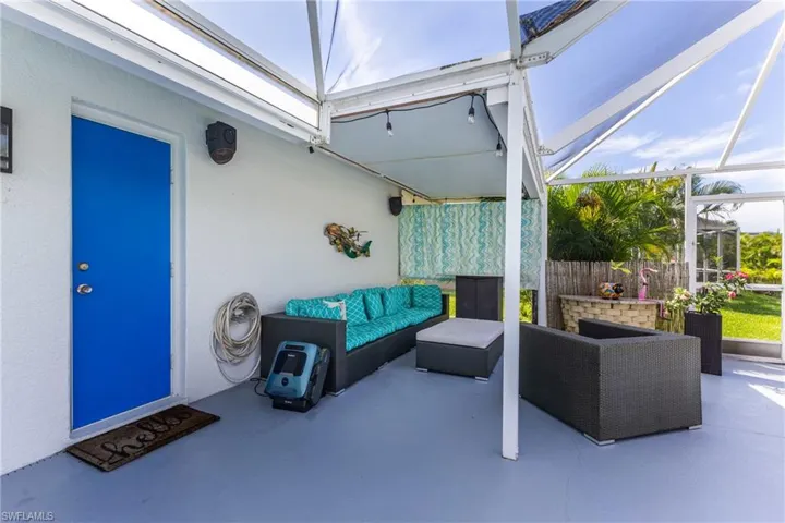 View of patio / terrace featuring a lanai, an outdoor hangout area, and a sunroom
