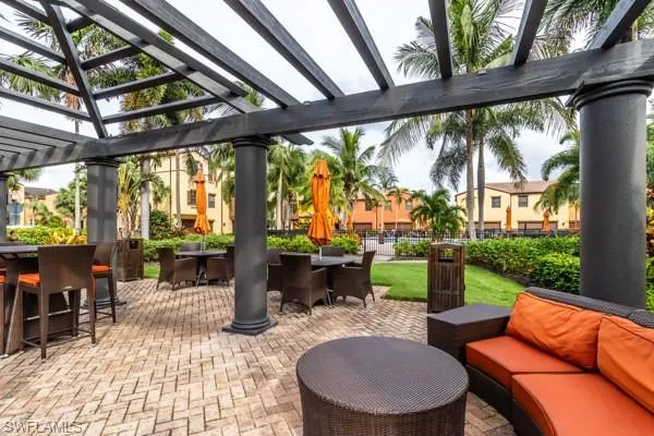 View of patio / terrace featuring outdoor lounge area and a pergola