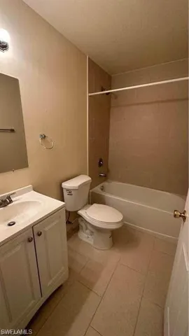 Full bath with vanity and tub / shower combination