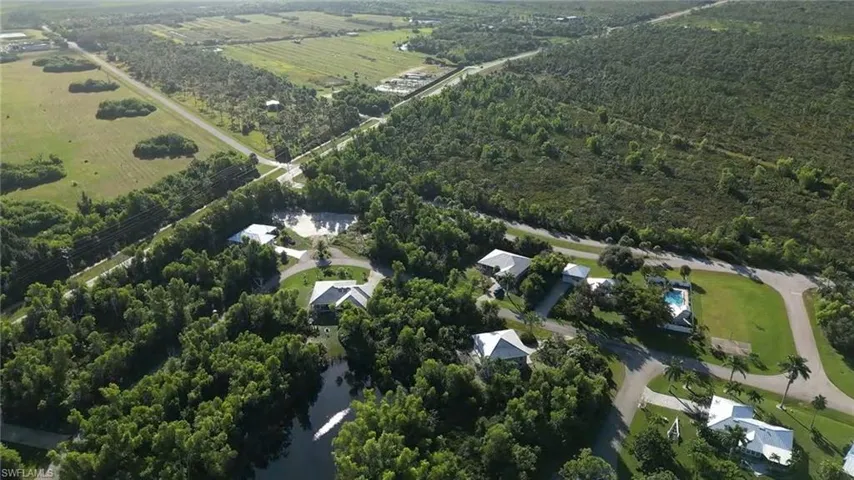View of property location with a nearby body of water and rural landscape