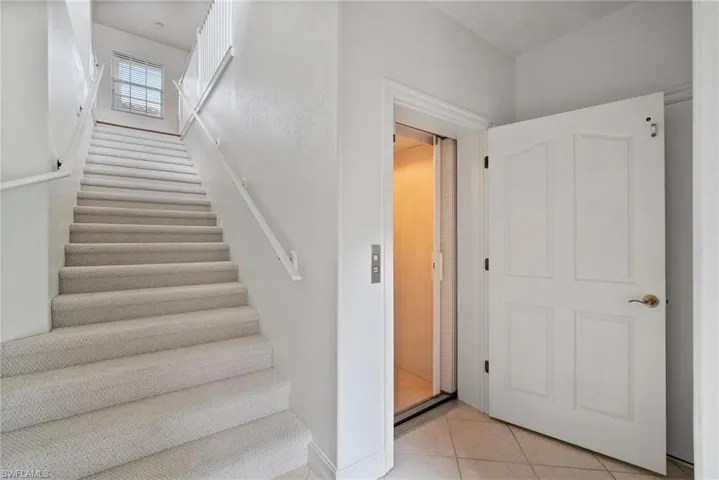 Stairway with tile patterned floors