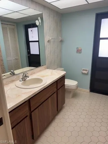 Bathroom with vanity and toilet