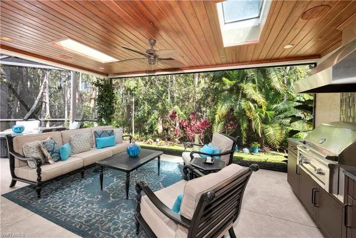 Covered outdoor area with outdoor kitchen