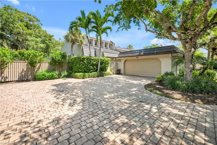 Large Driveway and 2 Car Garage