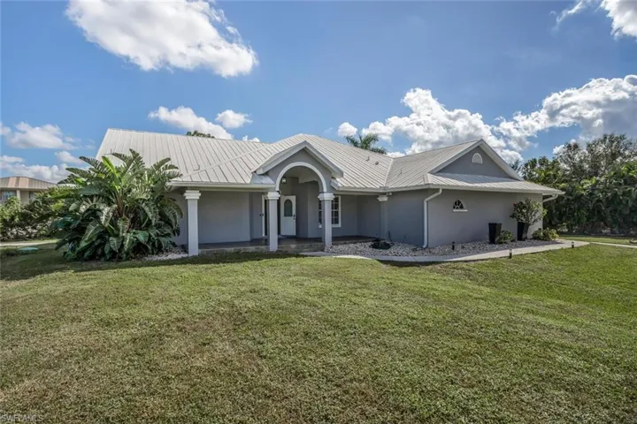 Ranch-style home with a front yard