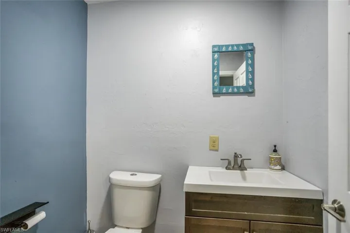 Guest Bathroom with vanity and toilet