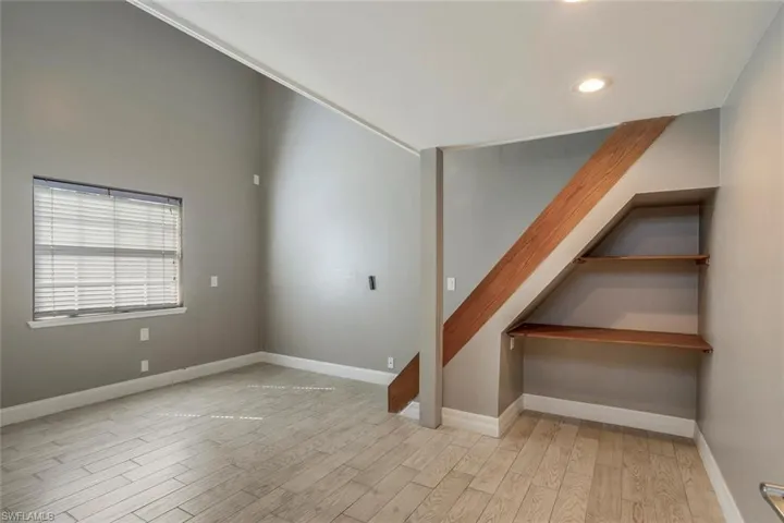 Additional living space featuring light hardwood / wood-style flooring