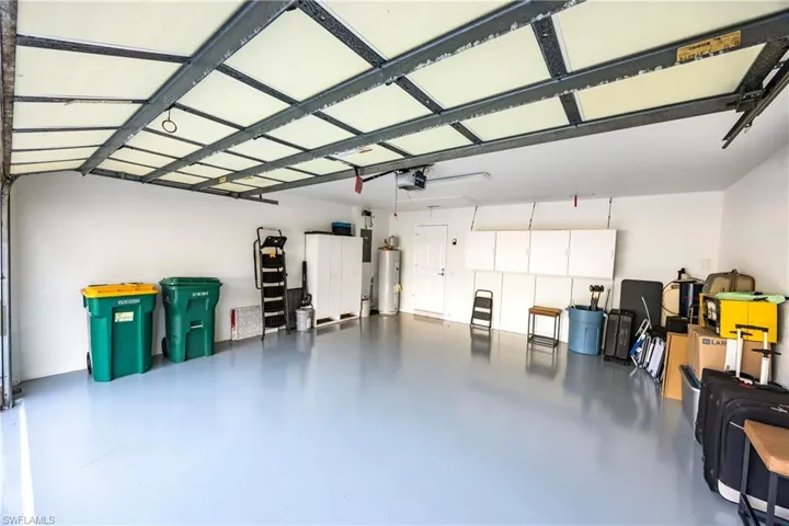 Garage featuring water heater