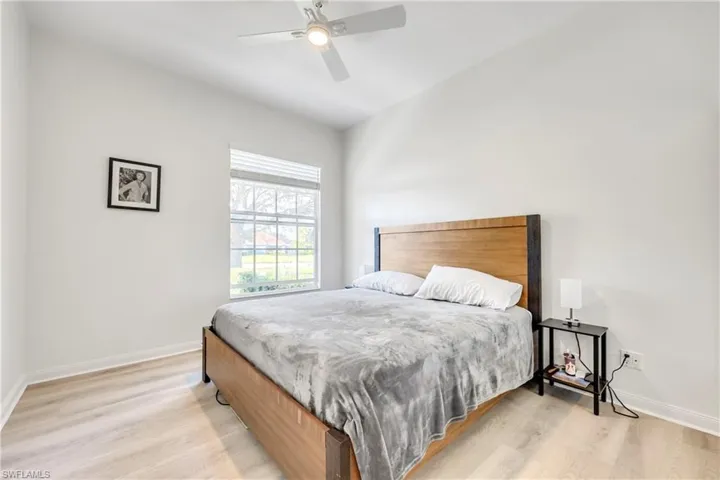 Bedroom featuring light wood-style flooring and ceiling fan