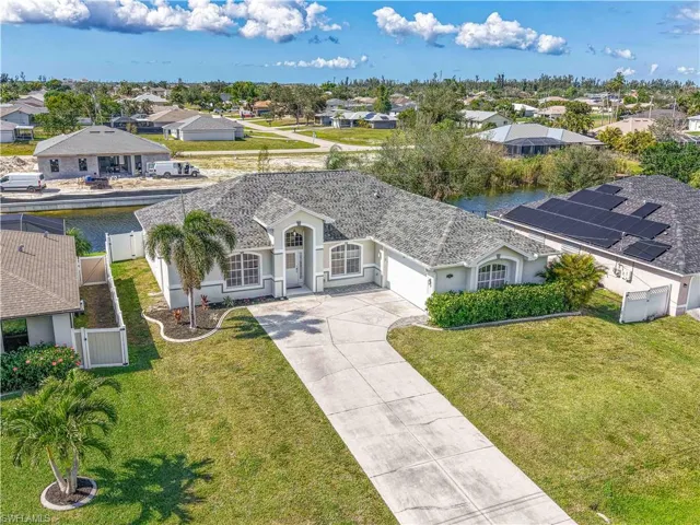 Bird's eye view with a water view and a residential view