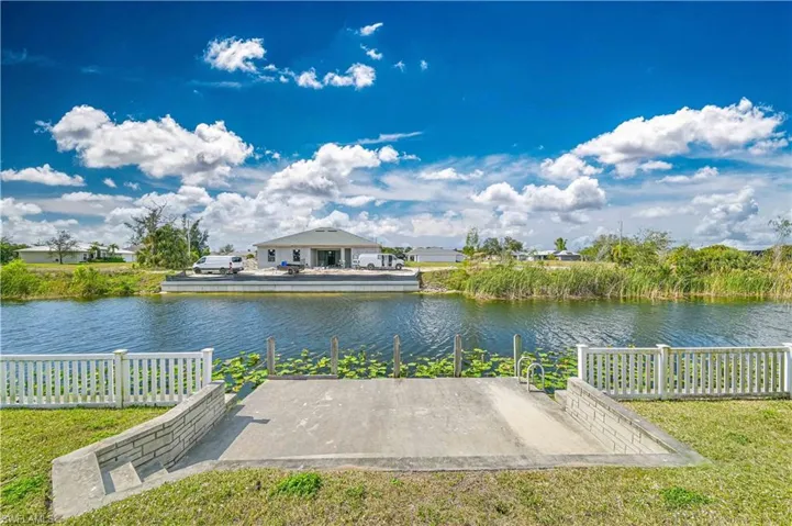 Property view of water with fence