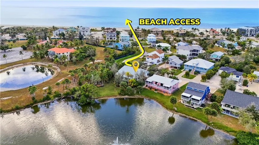 Aerial view of residential area featuring a large body of water - Virtually Edited Image
