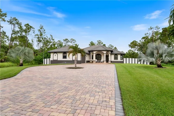 View of front facade with a front lawn