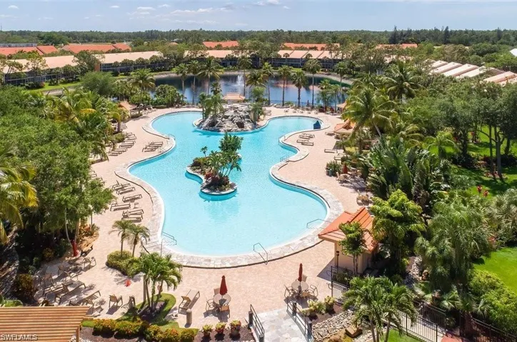 View of pool featuring a water view and a patio area