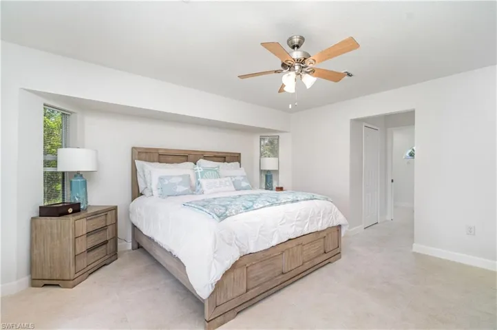 Bedroom featuring a closet and a ceiling fan