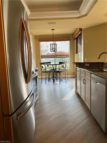 Updated kitchen, new flooring, and lighting