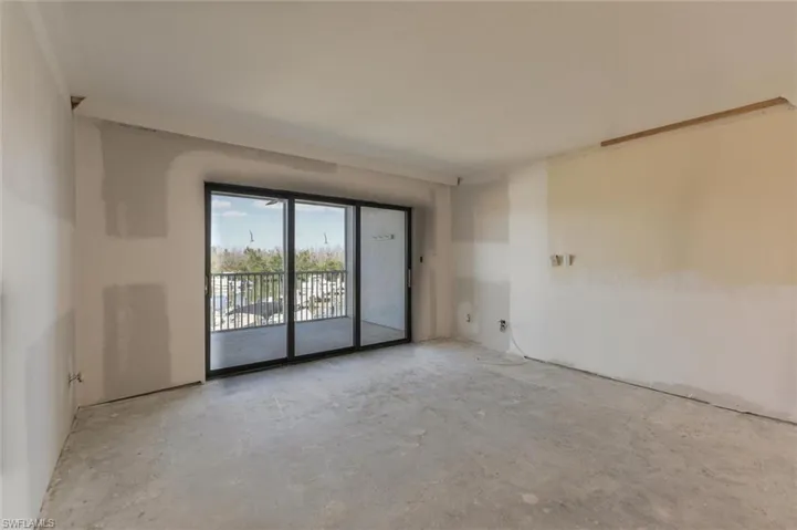 Spare room with concrete flooring