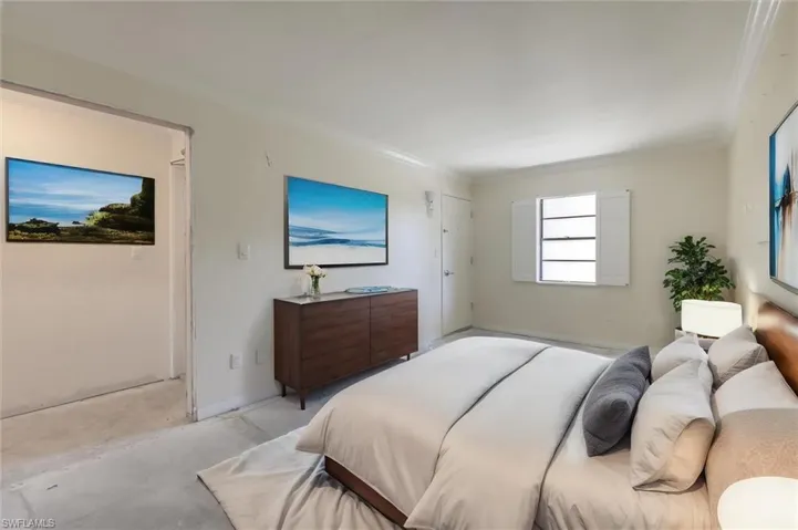 Bedroom featuring ornamental molding