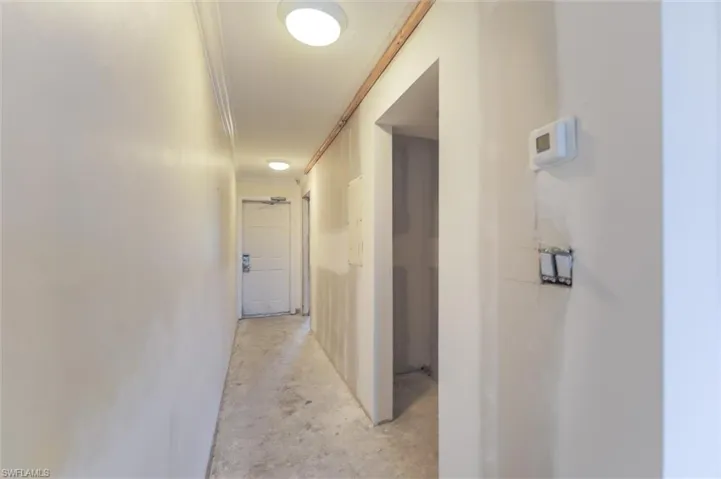 Hall featuring ornamental molding