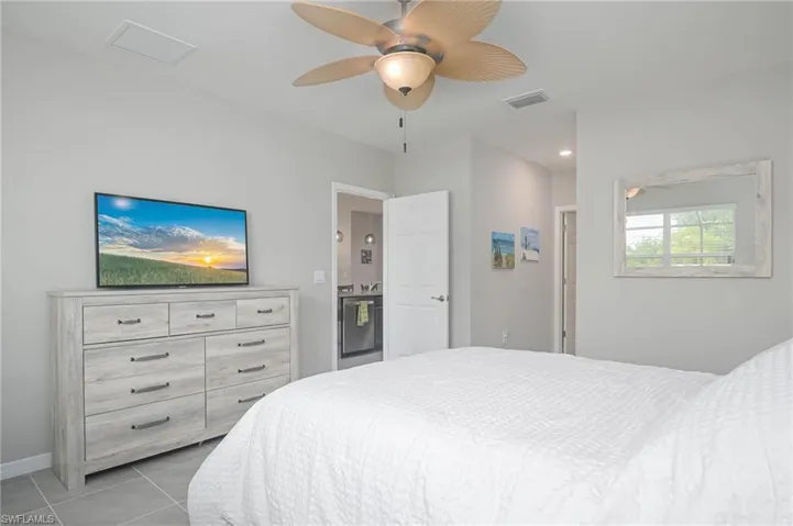 Bedroom featuring ceiling fan and light tile patterned floors