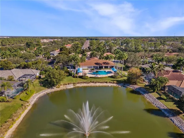Aerial view of residential area with a large body of water