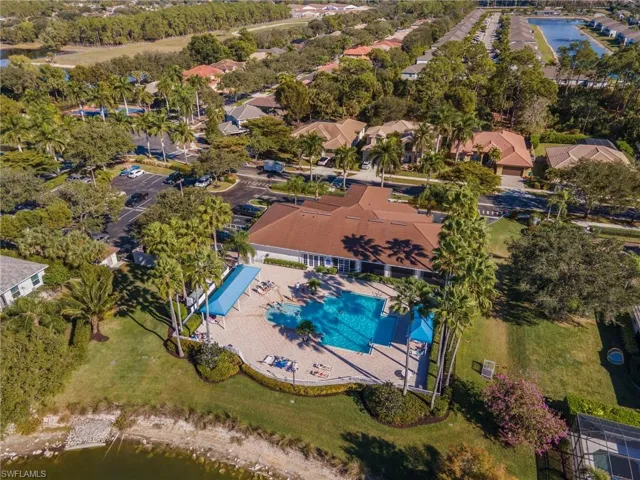 Aerial overview of property's location with a nearby body of water and nearby suburban area