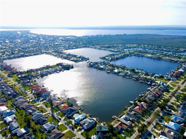 Bird's eye view with a water view and a residential view