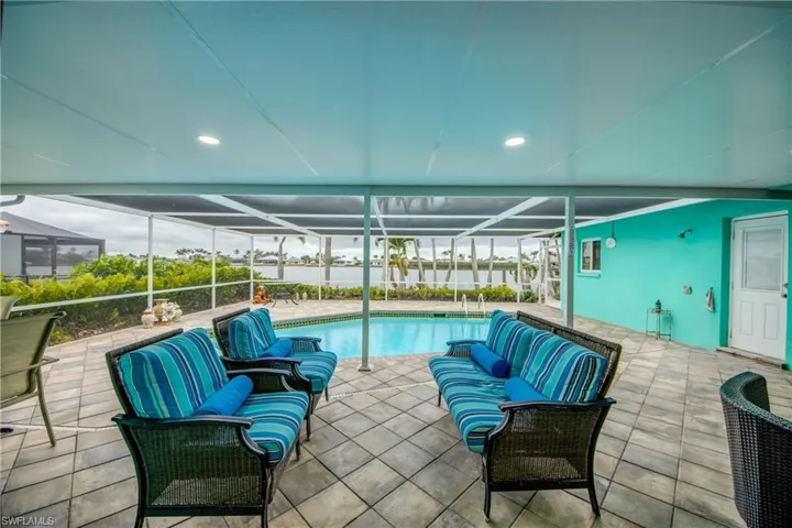 Saltwater heated pool with a screened lanai