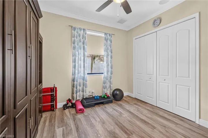 Guest bedroom 1 or work out room with bed up
