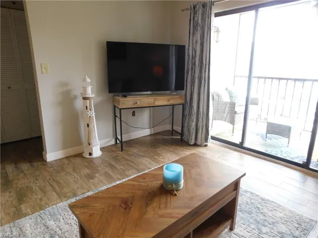 Living room featuring hardwood / wood-style floors