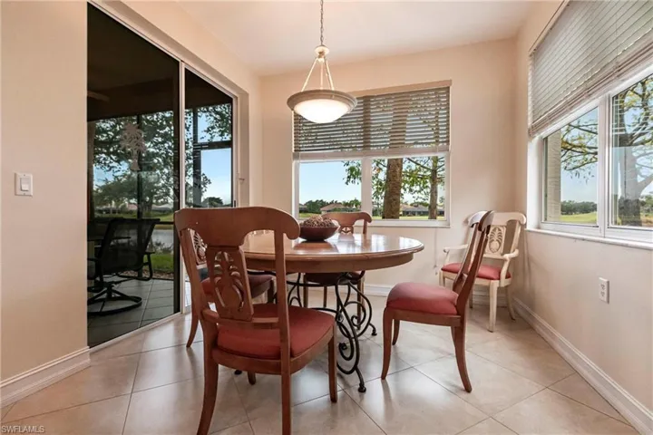 Dinette with western view of lake and golf course