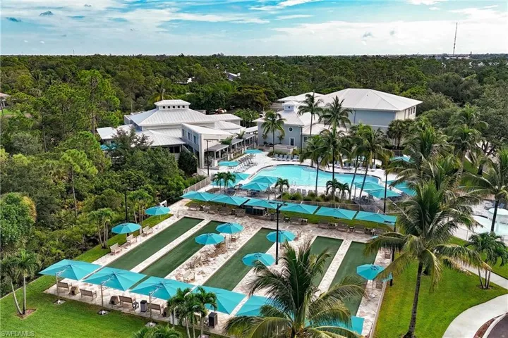 River club complex, with pool, bocce, restaurant, fitness center, and more