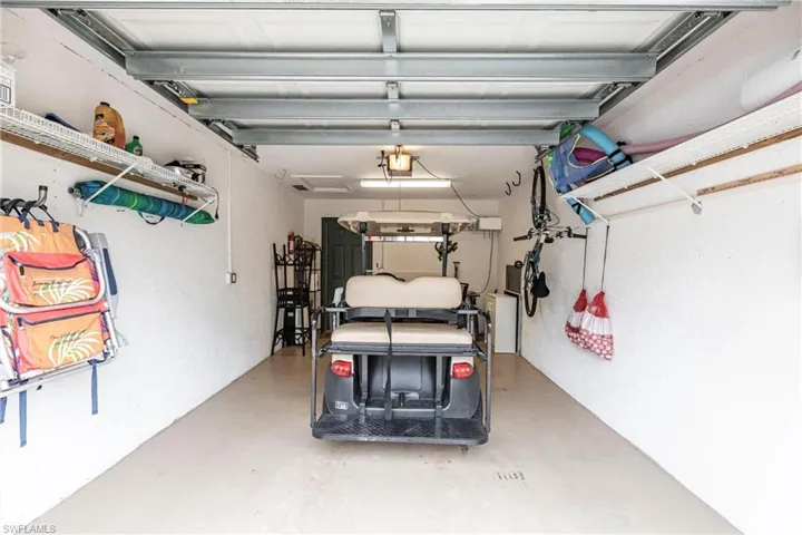 Garage with included golf cart