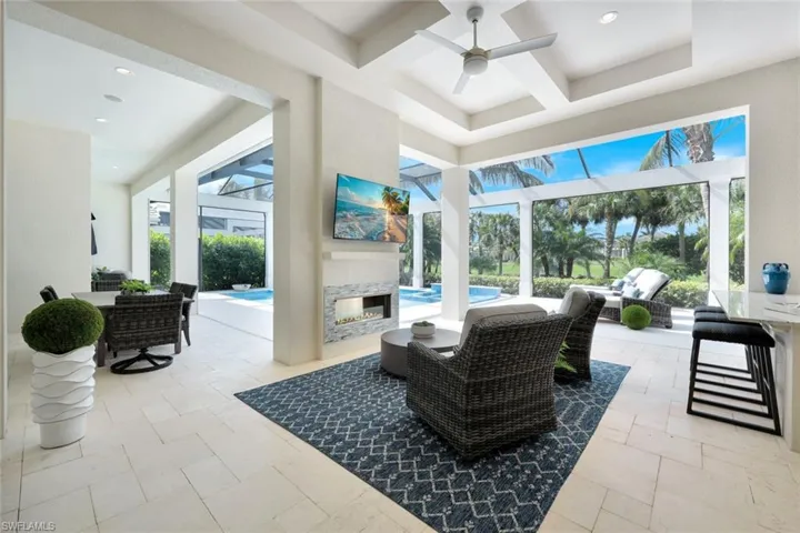 View of patio / terrace with ceiling fan and an outdoor hangout area