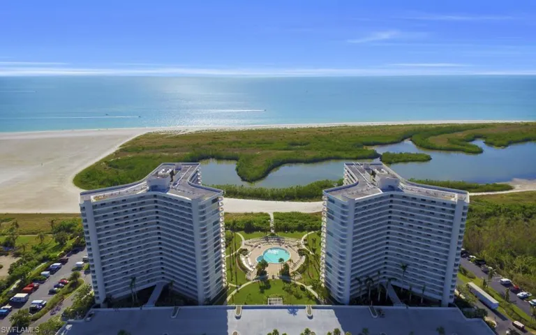 Bird's eye view of a large body of water and a pool