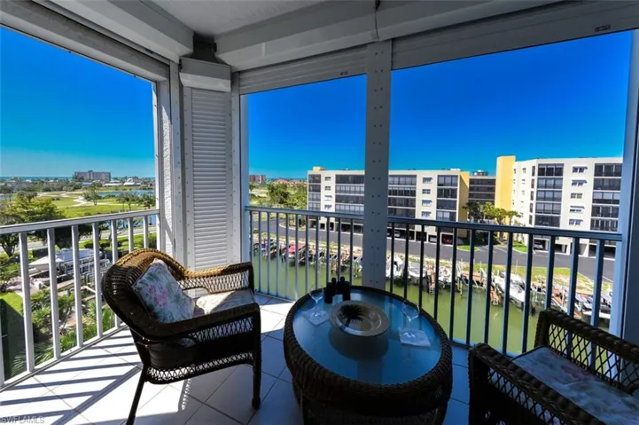GULF, BAY BEACH COMMONS AND CANAL VIEWS FROM THIS CORNER LANAI