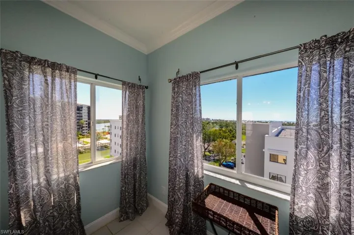 DINING AREA WINDOW  ESTERO BAY, CANAL AND DISTANT GULF VIEWS