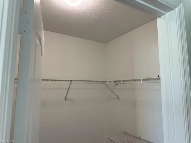 Bedroom 2 with 2 Large Walk In Sized Closets and 1 Linen Closet.