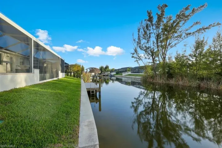 Water view with a boat dock