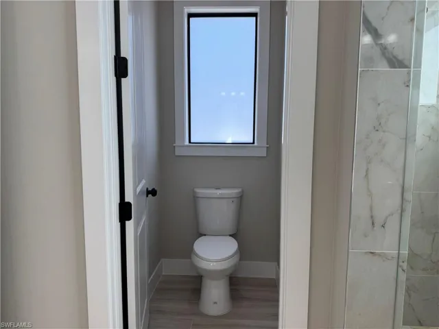 Primary Bathroom with toilet