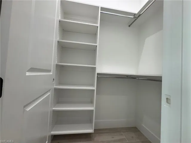 Walk in closet with light