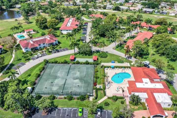 Bird's eye view of a large body of water and a local golf course