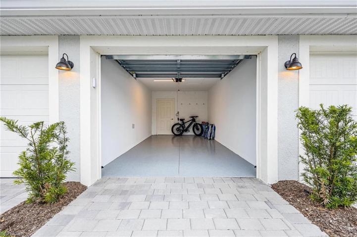 Detached Garage w/ Paver Driveway.