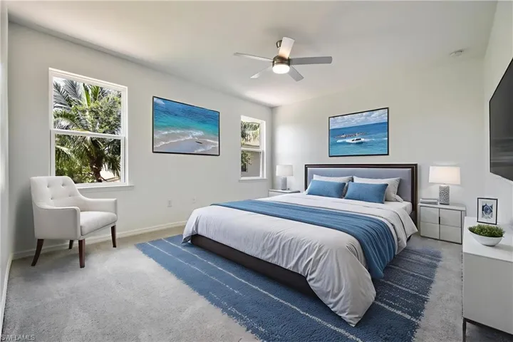 Bedroom with carpet flooring and ceiling fan