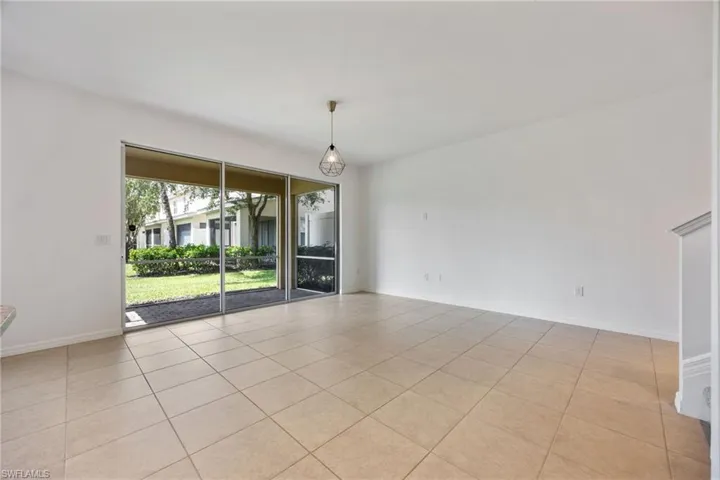 Living Room Area with Sliders going out to the covered lanai