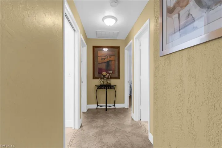 Hall featuring baseboards